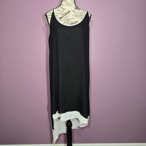 BCBG MAXAZRIA asymmetrical flowy sleeveless dress.  Size M